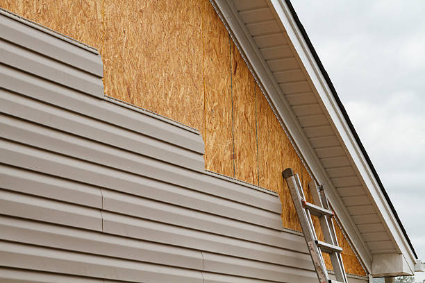 Professional Emergency Siding Repair technician working in Roxboro, NC